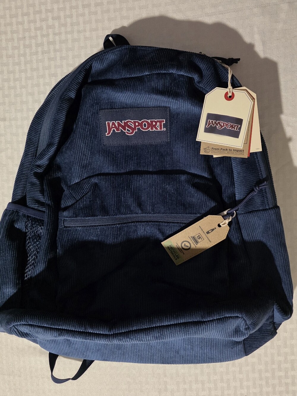Jansport Navy Corduroy Backpack with Red Logo